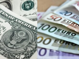 Supera el dólar al euro por primera vez en 20 años