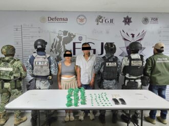 Cae pareja con arsenal y cargamento de droga en Tabasco