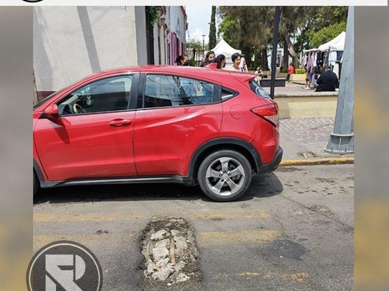 La Crítica Gráfica: Advertencia de crecimiento de bache