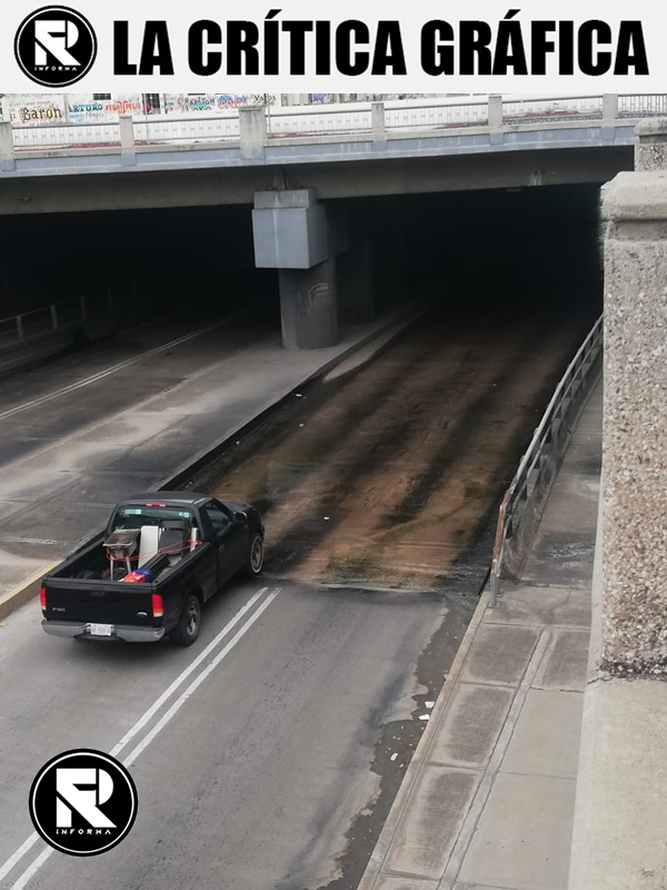 La Crítica Gráfica: Paso a desnivel inundado